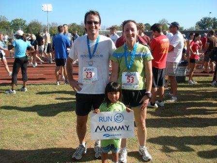 Kasen with Mom and Uncle Mike after half marathon